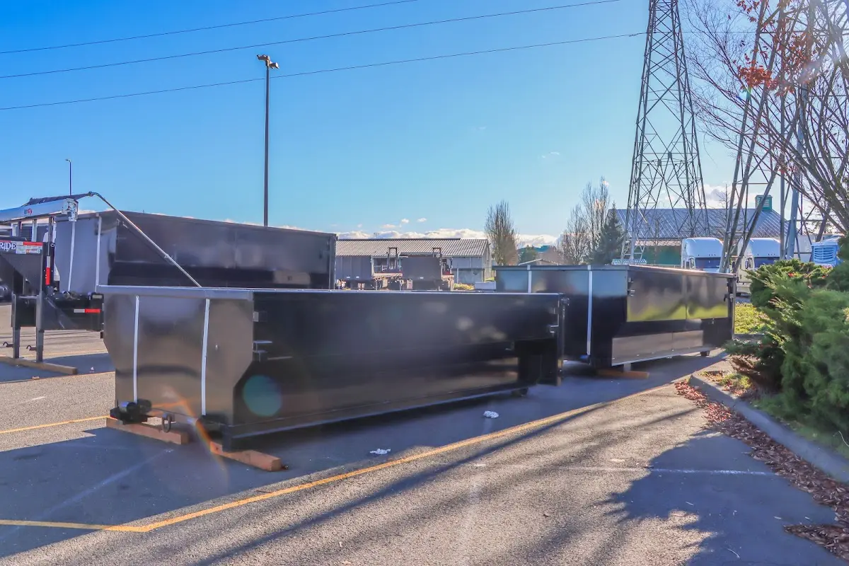 Roll-off dumpster ready for waste disposal at job site for Commercial Dumpster Rental in Groveland